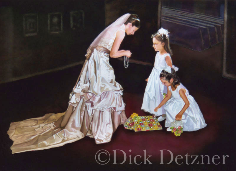 2 five-year-old girls dressed in white gowns being given necklaces by a woman in a wedding dress