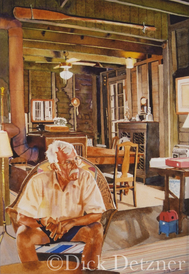 elderly man sitting in a summer cottage